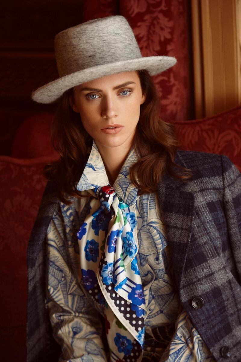 Tartan coat (€425 Magee), printed shirt (€560 Dries Van Noten), ‘Picnic Peerfect’ gold/green printed silk scarf (€130 Susannagh Grogan), printed skirt (€475 Dries Van Noten, Brown Thomas), grey mottled felt hat (€190 Anthony Peto)