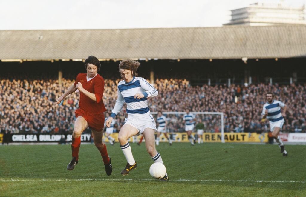 QPR's Stan Bowles fends off a challenge from Alan Hansen of Liverpool at Loftus Road in 1977. Bowles was a hugely popular figure among the London club's fans. Photograph: Tony Duffy/Allsport/Getty Images