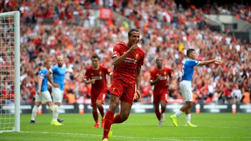 Joel Matip celebrates scoring Liverpool’s equaliser at Wembley. Photograph: Adam Davy/PA