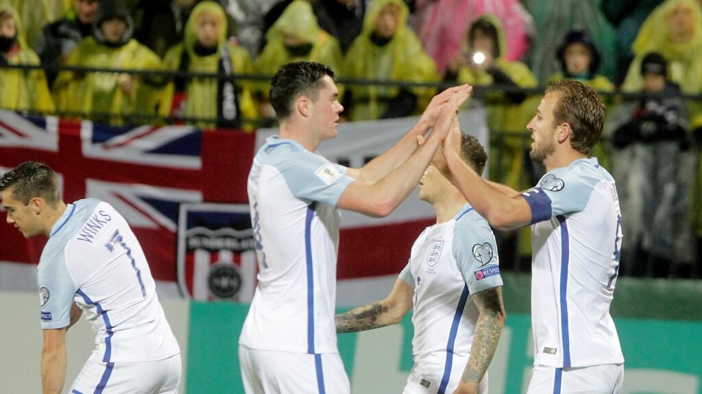 Harry Kane and Michael Keane of England celebrate after Kane’s penalty put them 1-0 up. Photo: Valda Kalnina/EPA