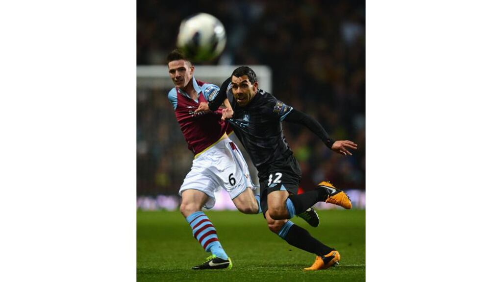 Republic of Ireland defender Ciaran Clark's slip proved costly for Aston Villa as Carlos Tevez (right) scored the winner for Man City. Photograph: Laurence Griffiths/Getty Images