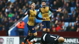 Arsenal stroll past sorry Aston Villa to go top of the table