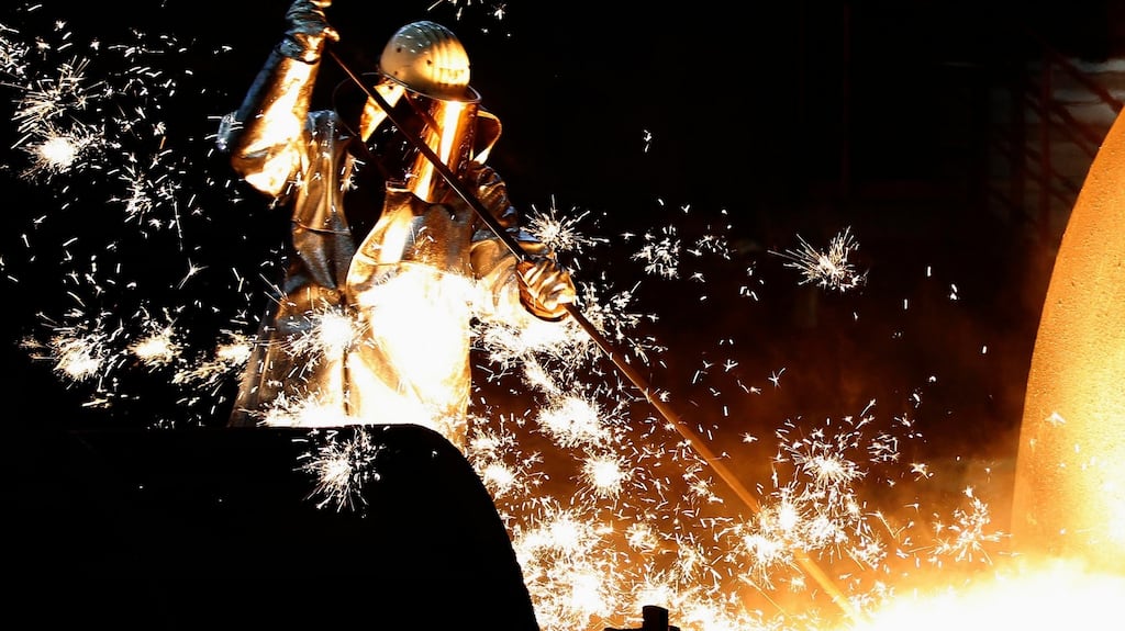 A worker controls a tapping of a blast furnace at Europe’s largest steel factory of Germany’s industrial conglomerate ThyssenKrupp AG in the western German city of Duisburg. Photograph: REUTERS/Ina Fassbender