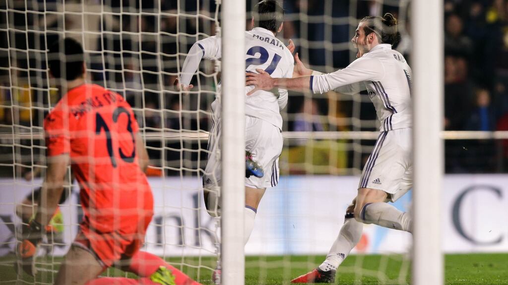 Real Madrid’s Alvaro Morata celebrates with Gareth Bale at El Madrigal stadium. Photograph: Getty Images