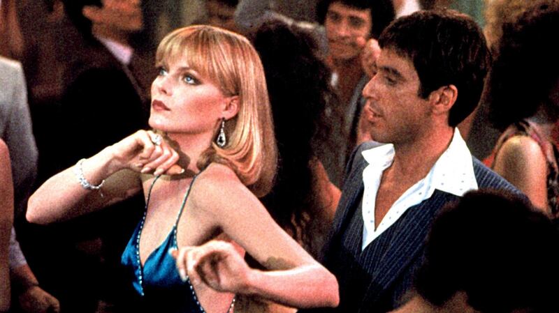 Crime and fashion have often gone hand in hand, in real life and on the silver screen. Michelle Pfeiffer (Elvira Hancock) and Al Pacino (Scareface) in the movie Scarface. His white suits and silk shirts, complemented by her pristine tailoring semaphore the wealth and status generated by his drug empire.