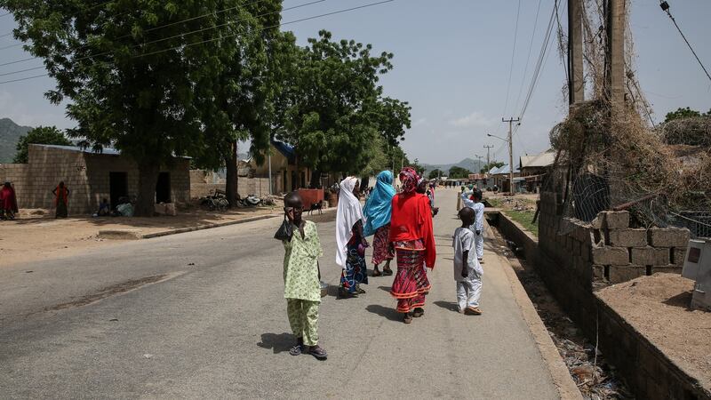 Girls walk about in central Gwoza, Borno State, northeast Nigeria. Photograph: Sally Hayden