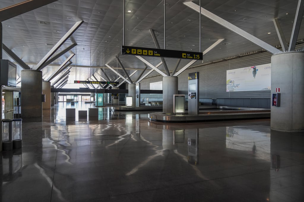 Empty baggage carousels in the arrivals hall at Ciudad Real International Airport in 2020. Photograph: Paul Hanna/Bloomberg via Getty Images