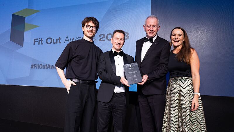 Stephen Pierce, irish agent at Vescom, presents the fit out project of the year – healthcare award to Tap Creative team