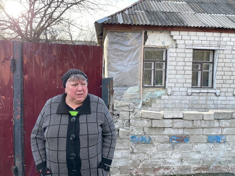 Retired schoolteacher Olha Fateeva, whose house in Chkalovske had its windows blown out and front wall badly damaged when a shell landed in her yard in 2022. Photograph: Daniel McLaughlin