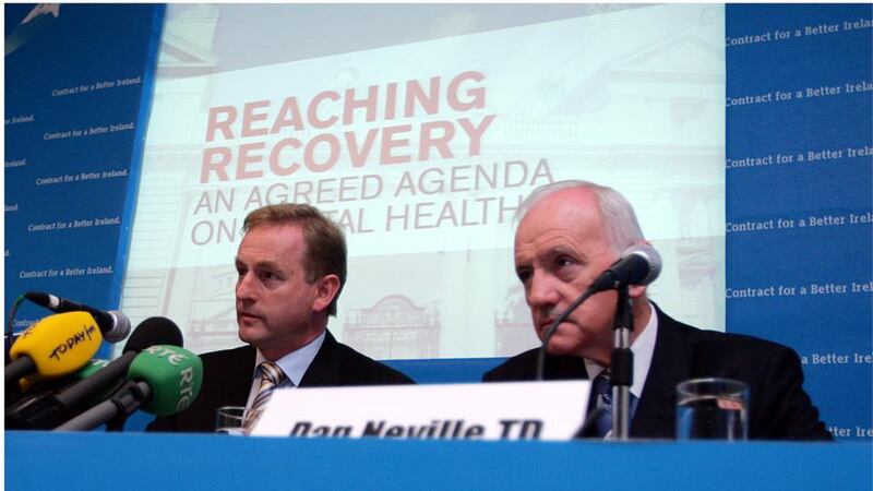 Fine Gael leader Enda Kenny and Dan Neville TD announcing plans to address the issue of mental illness. Photograph: Bryan O’Brien