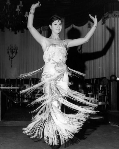 April Ashley on stage with her song and dance act at the Astor Club in London, 1962. Photograph: Keystone/Getty