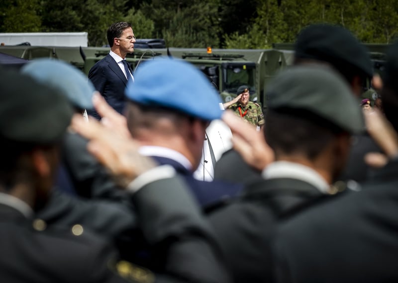 Dutch prime minister Mark Rutte delivers a speech during a meeting with veterans who had to guard the Bosnian enclave of Srebrenica in 1995. They are receiving formal apologies from the Dutch government. Photograph: Remko de Waal/ANP/AFP