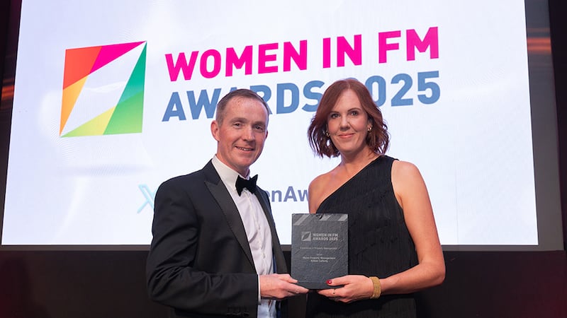 Trevor Smyth, awards judge, presents the excellence in property management award to Aimée Cafferty, Wyse Property Management