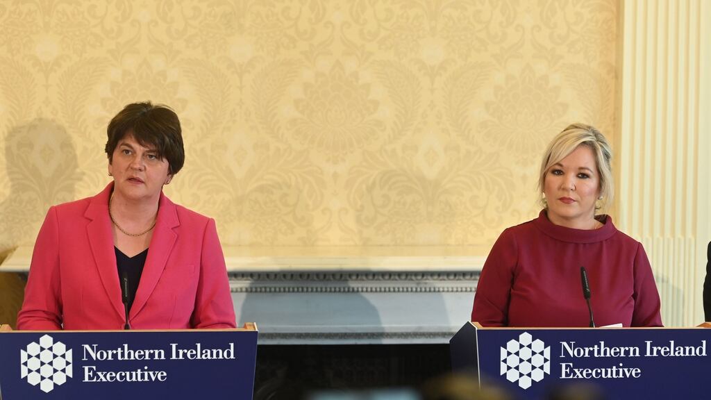 First Minister Arlene Foster (left) and Deputy First Minister Michelle O’Neill give a Covid-19 press briefing in Stormont on Thursday. File photograph: Colm Lenaghan/PA