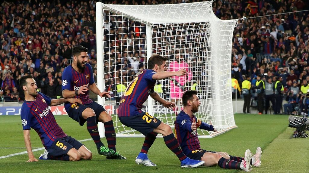 Barcelona’s Lionel Messi celebrates scoring their third goal with Sergi Roberto, Luis Suarez and Sergio Busquets during the Champions League semi-final first leg at the Camp Nou. Photograph: Susana Vera/Reuters