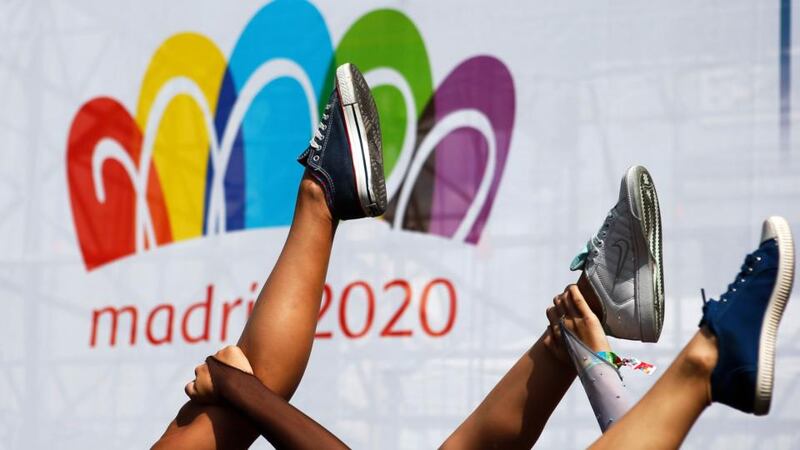 Young gymnasts from Vallecas outside Madrid stretch as they pose for photographs before performing infront of the International Olympic Committee today. Photograph: Susana Vera/Reuters