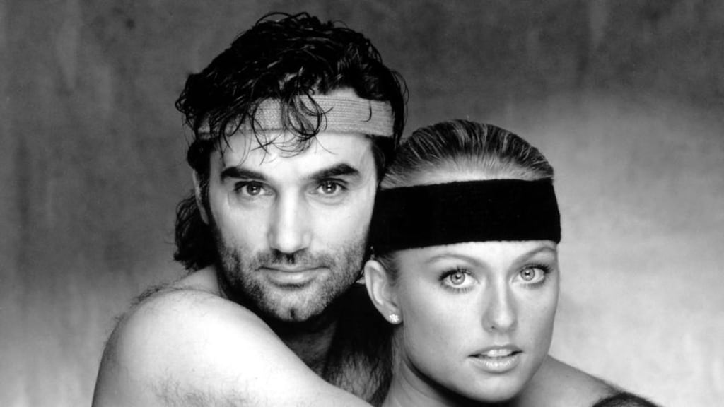 George Best with Swedish former Miss World Mary Stavin, publicising their fitness routine for lovers, “It Takes Two To Shape Up And Dance.”