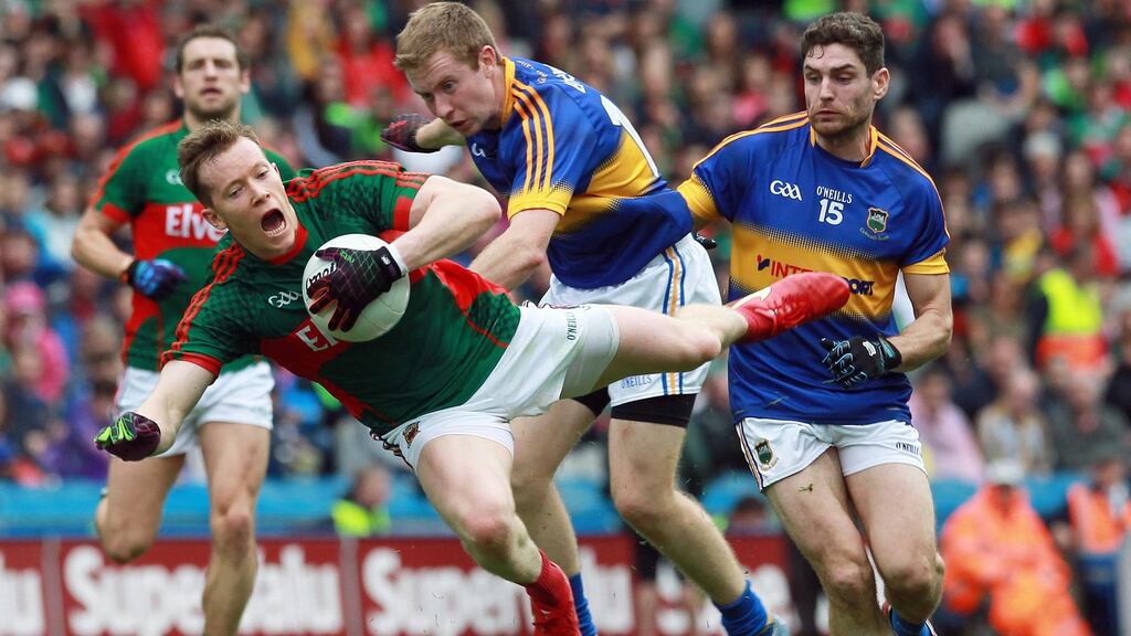 Mayo’s Cillian O’Connor is tackled by Brian Fox of Tipperary during Sunday’s All-Ireland senior football semi-final at Croke Park. Photograph: Lorraine O’Sullivan/Inpho.