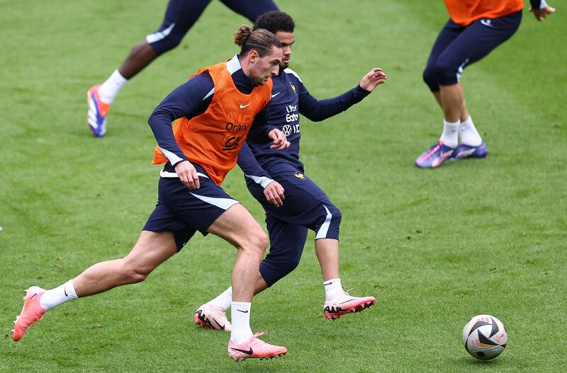 Adrien Rabiot (left) fights for the ball with Warren Zaire Emery during a France training session ahead of the Euro 2024 semi-final against Spain in Munich on Tuesday night. Photograph: Franck Fife/AFP via Getty Images