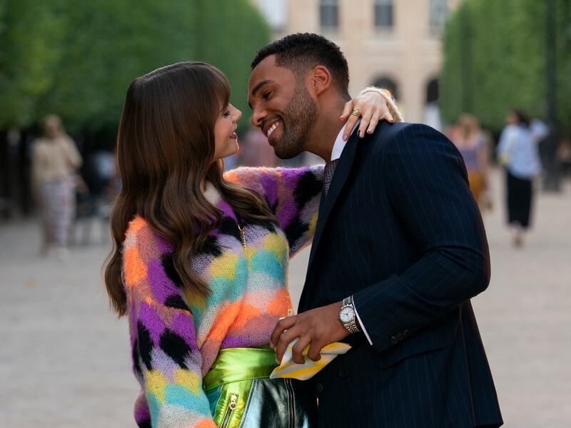 Emily in Paris: Lily Collins as Emily, Lucien Laviscount as Alfie in season 3. Photograph: Stéphanie Branchu/Netflix
