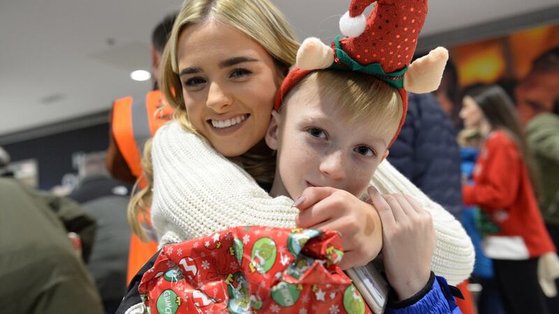 Kate Everard from Kilkenny meets Vasili Karas at Dublin Airport. Photograph: Dara Mac Dónaill/The Irish Times