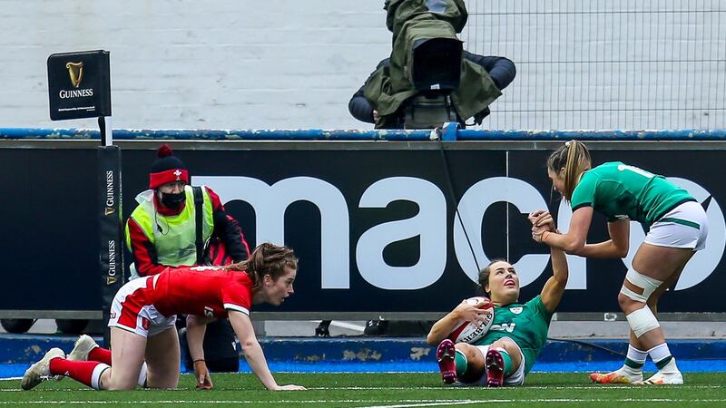 Ireland’s Beibhinn Parsons celebrates after scoring a try with Eimear Considine against Wales in the Six Nations Championship. Photograph: Robbie Stephenson/Inpho