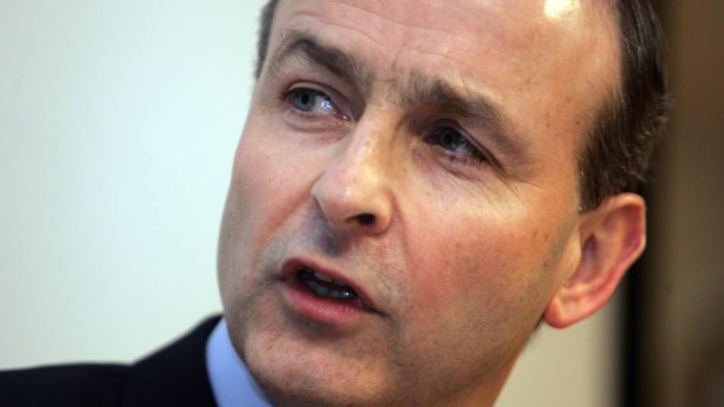 Micheál Martin: said the VHI had confirmed that only 10 of its 93 policies would not be affected by new measures.