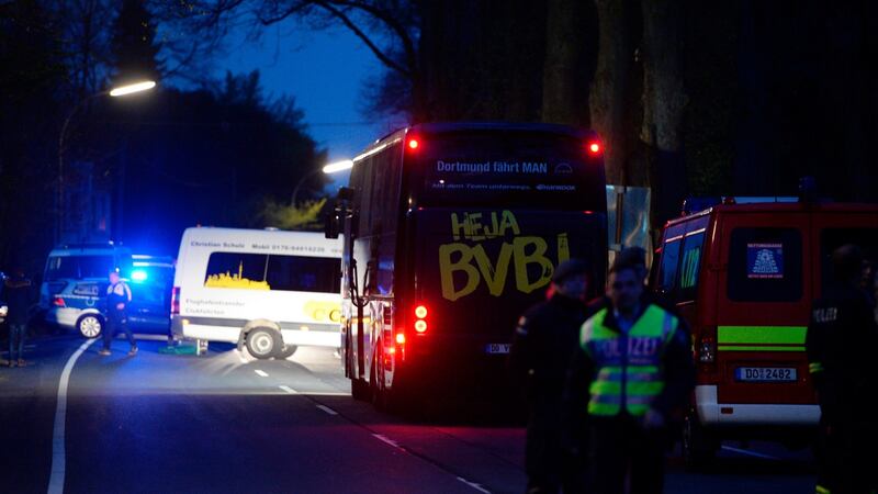 The Borussia Dortmund bus after it was damaged by an explosion before their Champions League clash with Monaco. Photo: Sascha Schuermann/Getty Images