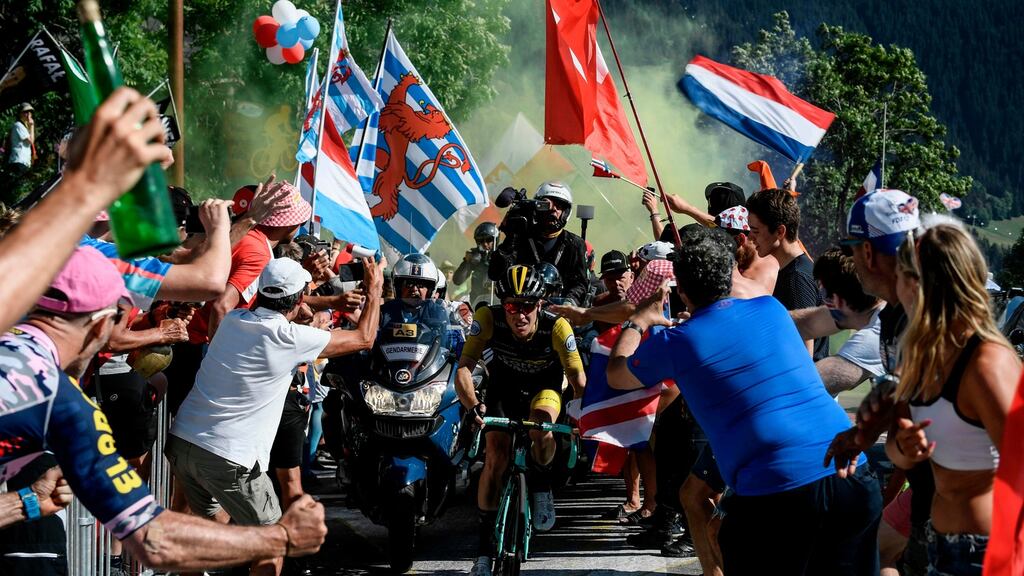 Netherlands’ Steven Kruijswijk rides through spectators in the ascent to l’Alpe d’Huez during the twelfth stage of the 2018 Tour de France . Photo: Philippe Lopez/Getty Images
