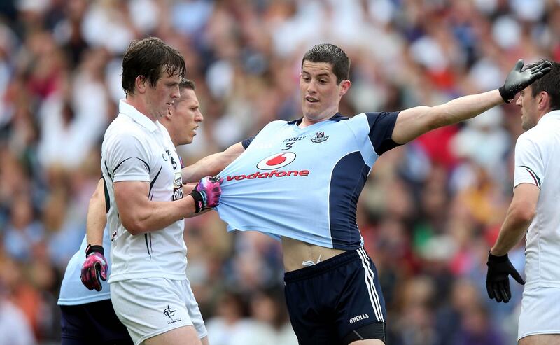 Dublin’s Rory O’Carroll with Paddy Brophy of Kildare at Croke Park. Photograph: Donall Farmer/Inpho