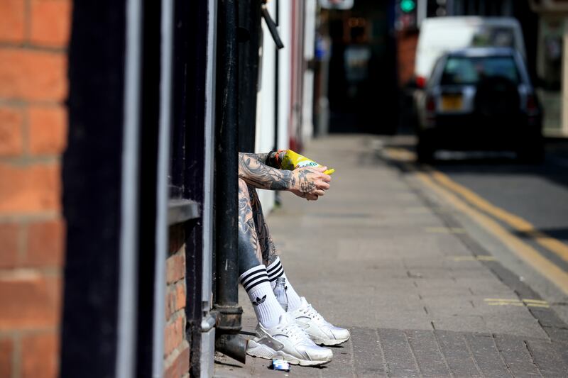 The Full English: a man sits on a doorstep in Boston, in northeast England; the town registered Britain's strongest support for Brexit in the 2016 referendum. Photograph: Lindsey Parnaby/AFP via Getty