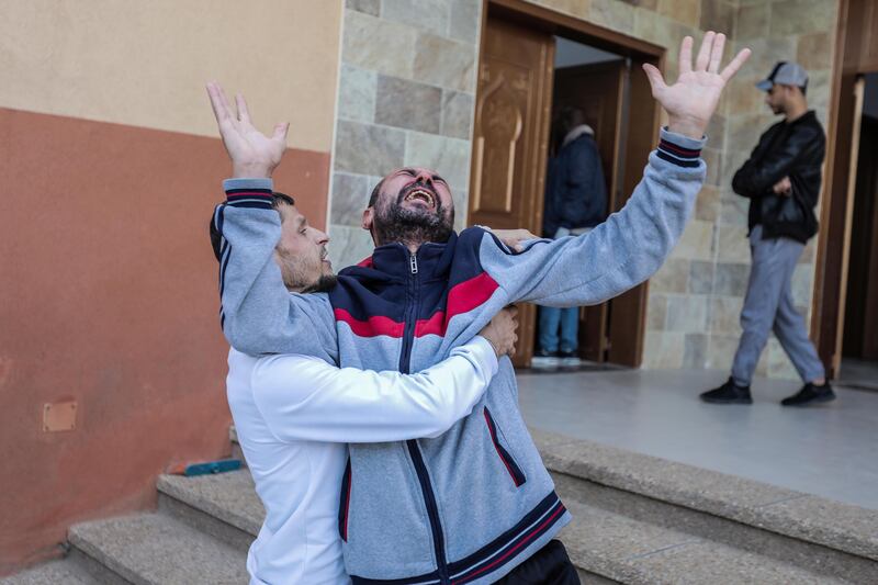 People mourn as they collect the bodies of Palestinians killed in airstrikes on Wednesday in Khan Yunis, Gaza. Photograph: Ahmad Hasaballah/Getty Images
