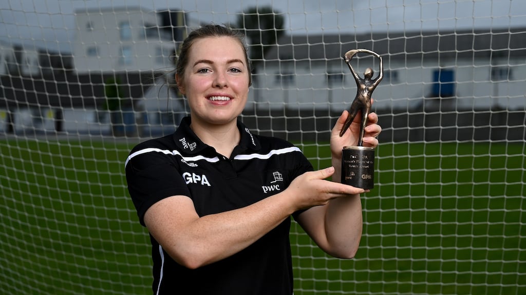 Gráinne Egan with her PwC GPA Women’s Camogie Player of the Month Award for May at Tullamore GAA club in Offaly. Photograph: Piaras Ó Mídheach/Sportsfile