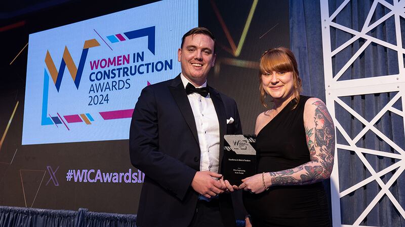 Conor Cooney, managing director, Falcon Green, presents the excellence in bids and tenders award to Rosie Maclot, Ethos Engineering