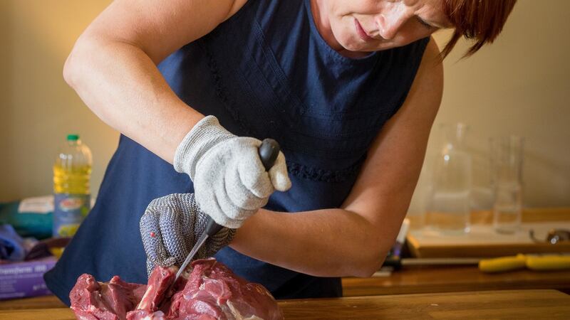 Elsie McCay, from Co Tyrone, boning out a shoulder during an introduction to butchery course. Photograph: Dylan Vaughan