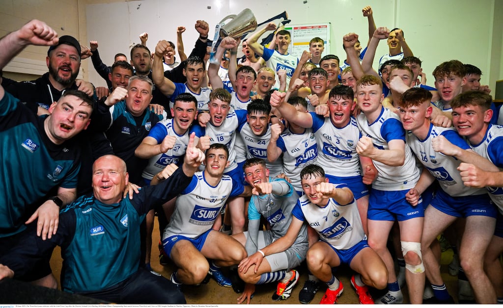 Waterford celebrate with the Irish Press Cup after their victory over Clare in the Electric Ireland MHC final at FBD Semple Stadium in Thurles. Photograph:  Brendan Moran/Sportsfile