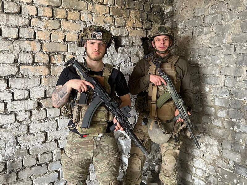 'Irlandets' with a fellow member of Ukraine's 3rd Assault Brigade who has the call sign 'Baglo': 'My first hit was when a bunch of Russian soldiers piled up in that building and I hit it directly.' Photograph courtesy of Irlandets