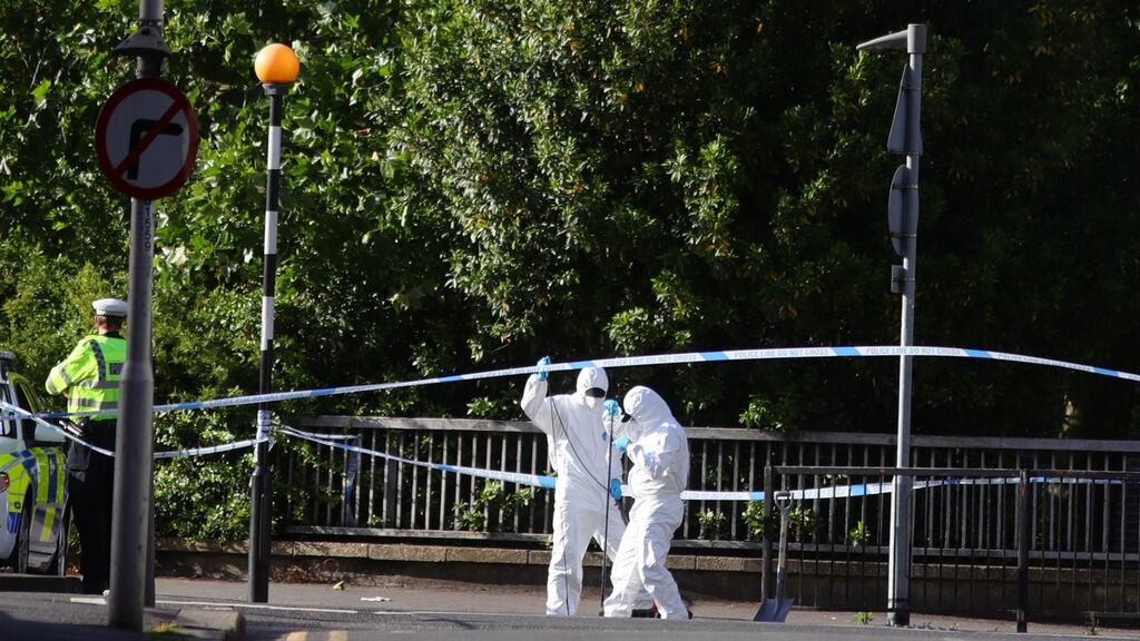 Forensic officers work near Forbury Gardens, in Reading town centre, the scene of a multiple stabbing attack that took place on Saturday evening. Photograph: Aaron Chown/PA Wire
