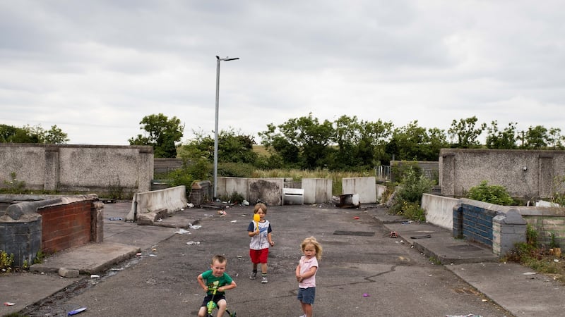 Thomas Ward,Tom Ward and Pearl Rose Ward playing at St Mary’s Halting Site, Cappagh Road, Finglas, Dublin. Photograph: Tom Honan