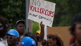 Rioting after black teen shot dead by police in Missouri