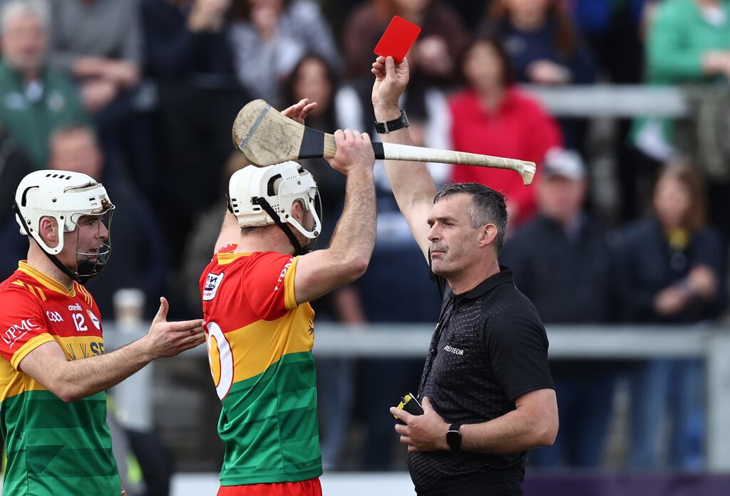 Carlow's Chris Nolan is shown a red card by referee James Owens. Photograph: Tom Maher/Inpho