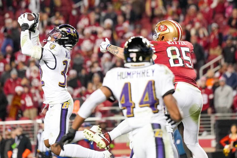 Marcus Williams of the Baltimore Ravens intercepts a pass intended for George Kittle of the San Francisco 49ers. Photograph: Thearon W. Henderson/Getty Images