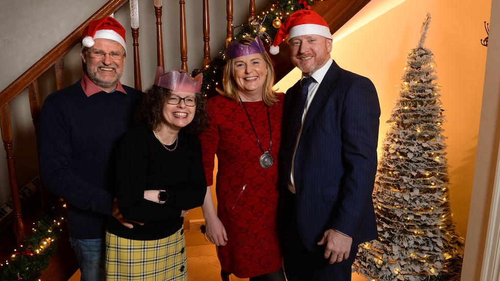 Kathryn and Fintan Cahill (right) in their home Virginia, Co Cavan with their guests for Christmas Rolf and Denise McLaughlin. Photograph: Dara Mac Donaill/The Irish Times.