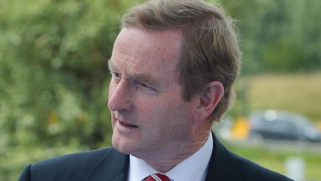 Taoiseach Enda Kenny arriving at the European People’s Party summit in Kortijk, Belgium today. He has insisted the Government will maintain its fiscal targets next year ahead of a meeting at which EU leaders will discuss how the application of budget rules can be loosened. Photograph: Stephanie LeCocq/EPA.