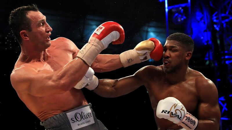Wladimir Klitschko and Anthony Joshua in action during the IBF, WBA and IBO Heavyweight World Title bout at Wembley Stadium in London. Photograph: Richard Heathcote/Getty Images
