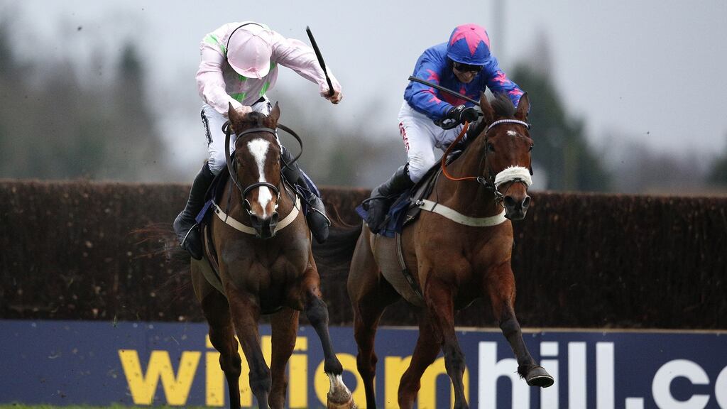 Cue Card battles Vautour en-route to victory in the 2015 King George at Kempton. Photograph: Alan Crowhurst/Getty
