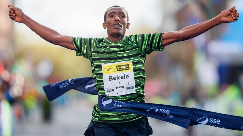 Asefa Bekele of Ethiopia crosses the line to win the 2018 SSE Airtricity Dublin Marathon. Photograph: Bryan Keane/Inpho