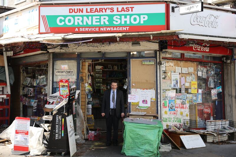 The shop's exterior with previous owner John Hyland standing in the door. Photograph: Nick Bradshaw