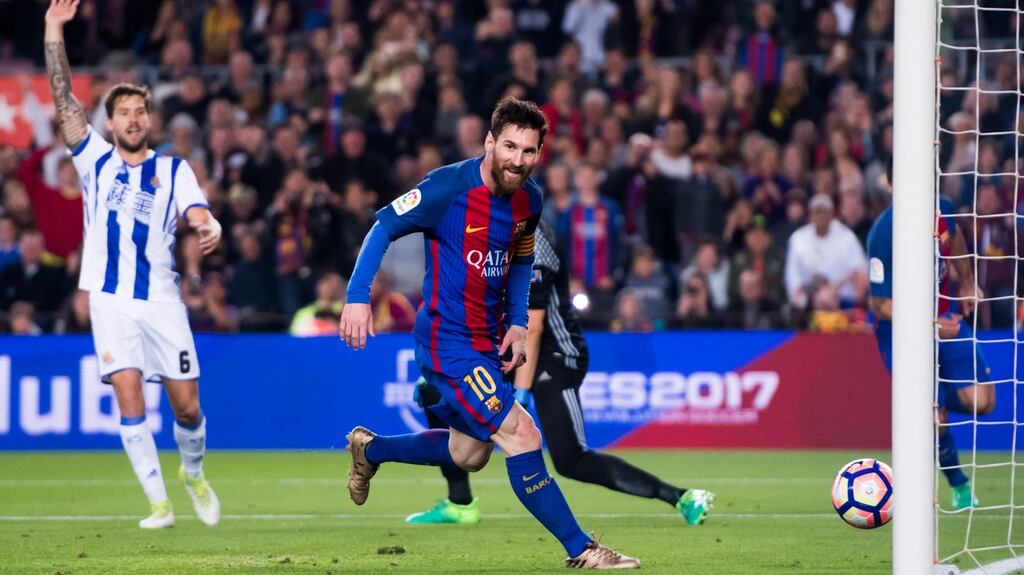 Lionel Messi scores his and Barcelona’s second goal in the La Liga game against   Real Sociedad  at the Nou Camp. Photograph:  Alex Caparros/Getty Images