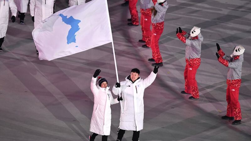 Unified inter-Korean team with flag bearers Chung Gum Hwang and Yunjong Won walked out during the opening ceremony. Photo: Christian Bruna/EPA